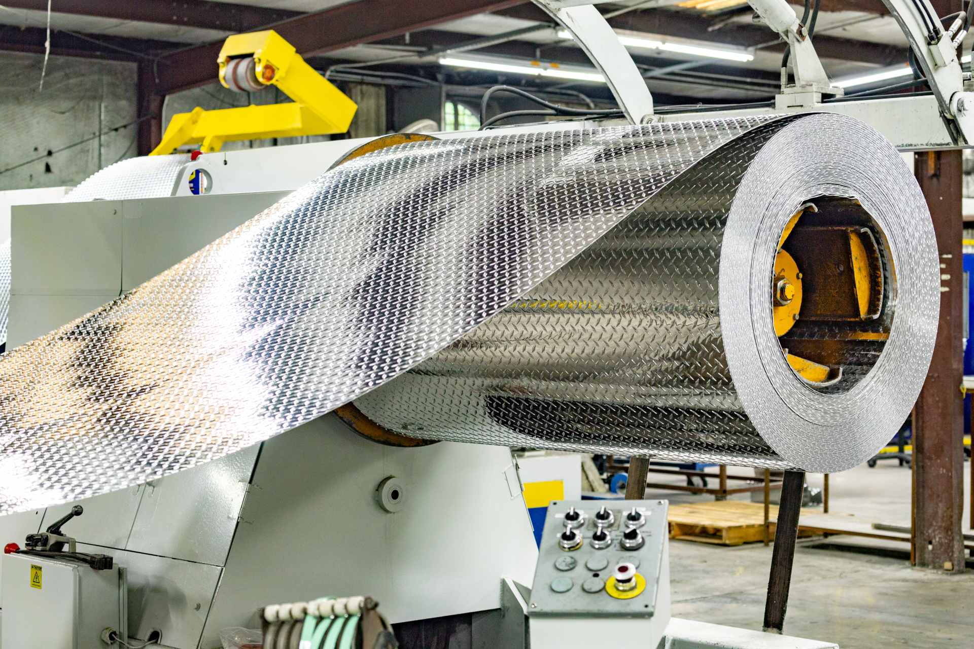 Diamond-Plate Aluminum Sheet Unrolled to Make Truck Tool Box